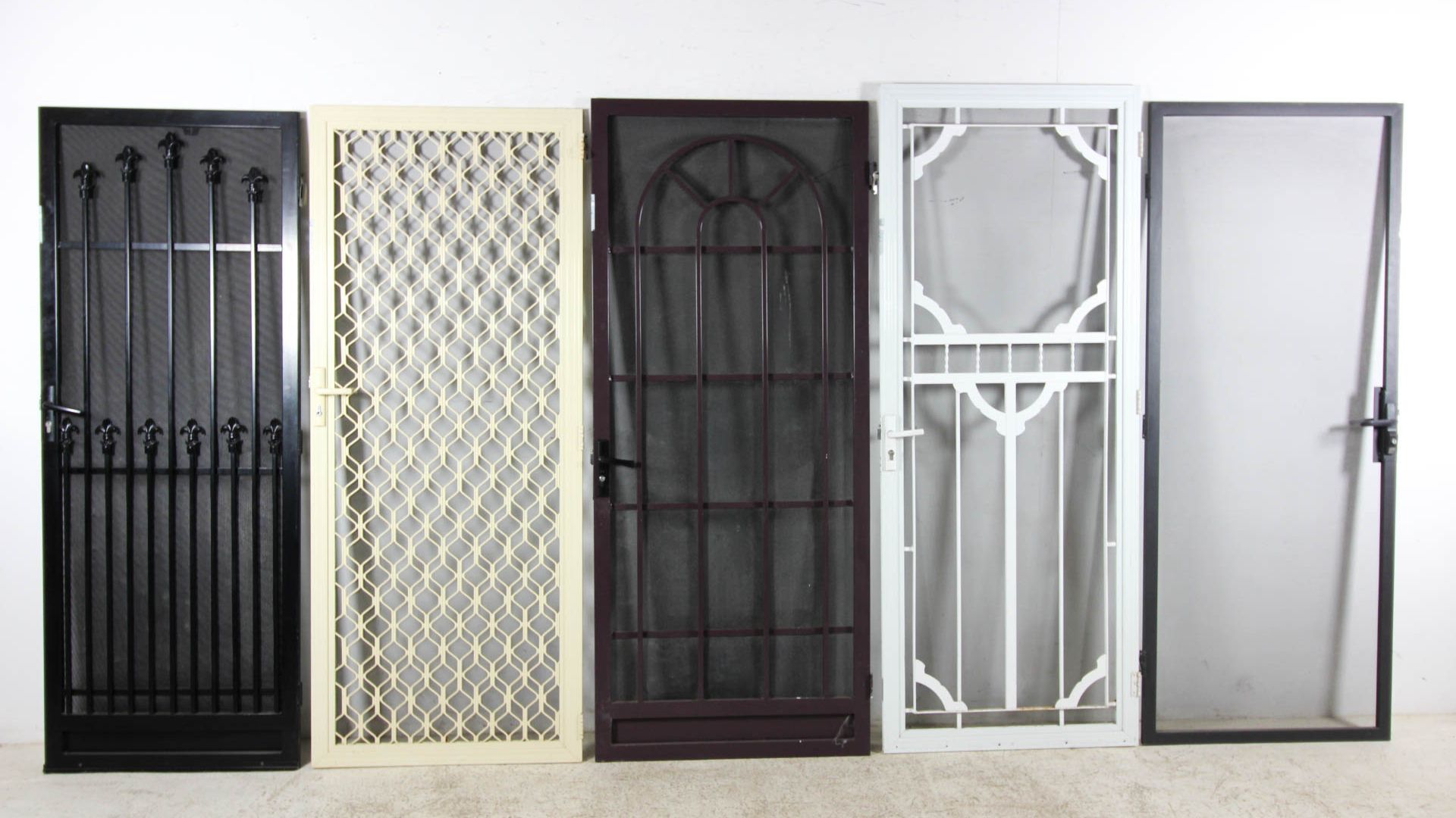 Top Interior Design - B Interior Elegant metal screen door design by B Interior in Bengaluru – combining style with security.